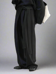 Asymmetrical Draped Black Trousers – Wide-Leg Knit Pants with Belted Detail-SimpleModerne