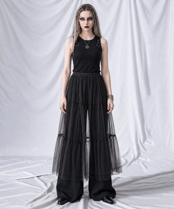 Black layered gauze overlay midi skirt, front view styled over black wide-leg trousers.