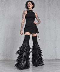 Three-quarter front view of black tassel flare leg warmers, showing the fitted upper cuffs and wide fringe-covered lower shape.