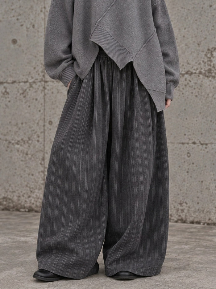 Charcoal Pinstripe Super Wide-Leg Trousers — close front view showing the cut and drape.