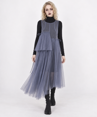 Blue-violet mesh layered midi dress in a walking pose, showing movement in the sheer pleated skirt.