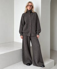 Coffee brown knitted cardigan and wide-leg trousers set on a blonde model, full-length front view.