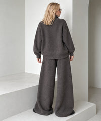 Back view of the coffee brown knitted cardigan and wide-leg trousers set, showing the dropped shoulders and loose silhouette.