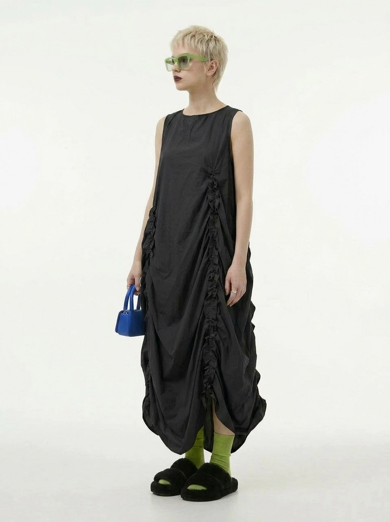avant garde black dress Minimalist Avant-Garde Draped – Oversized Ruched Midi in CO_227 Our birthday girl wearing exuding an air of Colour:CREAM