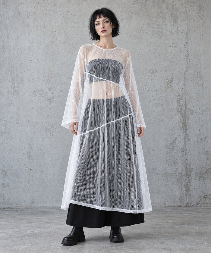 White layered gauze A-line maxi dress, full-length front view styled over a black bandeau and long skirt.