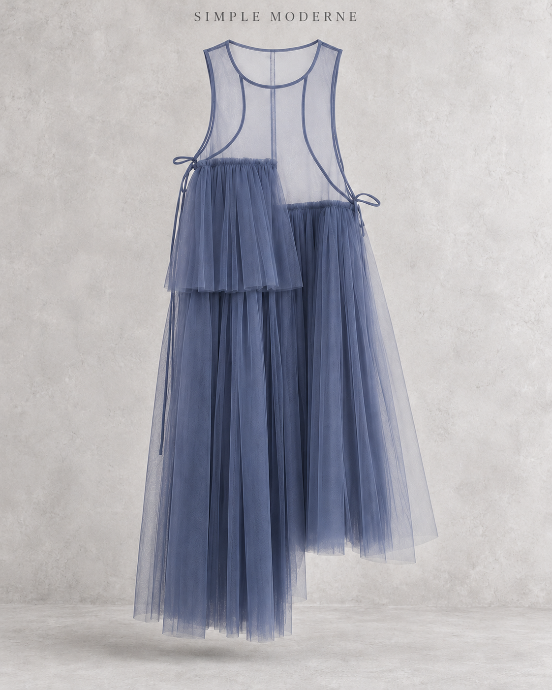 Cobalt blue mesh asymmetric layered midi dress displayed flat against a light concrete background.